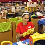 Cleaning toys at the Ronald McDonald House Charity Sale 2010